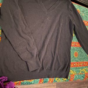 I am selling a black long sleeved sweater from Worthington.